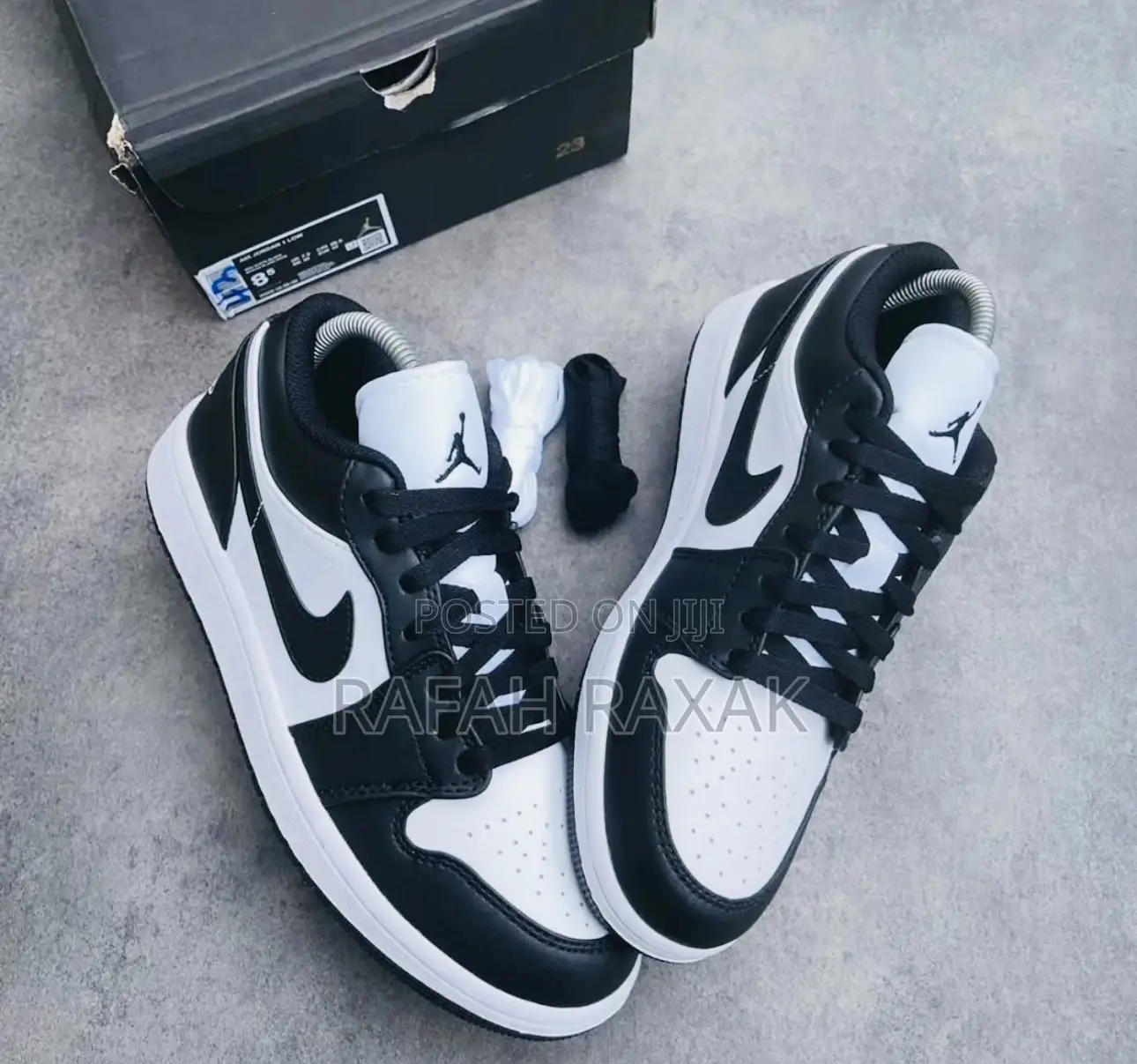 Unisex Black/White Nike Air Jordan 1 Low Retro Sneakers