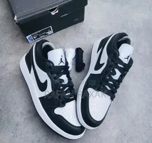 Unisex Black/White Nike Air Jordan 1 Low Retro Sneakers