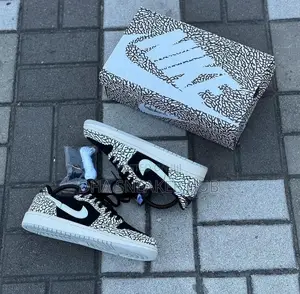 Photo - Nike Air Jordan 1 Low Animal Print