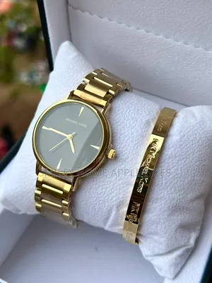 Michael Kors Ladies Golden Watch With a Bracelet