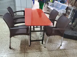 Set of Plastic Chairs and Foldable Table