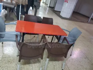 Set of Plastic Chairs and Foldable Table