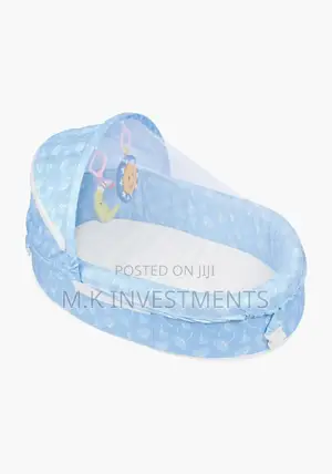 Photo - Tiibaby Travel Bassinet