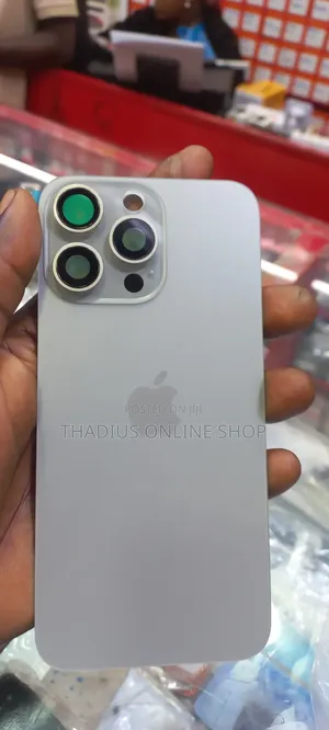 Photo - iPhone 15 Promax Nautral Titanium Back Glass Replacement