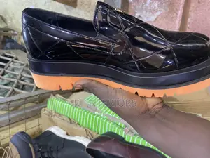 Brown Sole Shinny Black Shoes