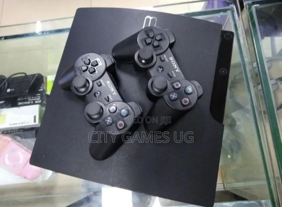 Sony Ps3 Slimconsole With Games and Pads