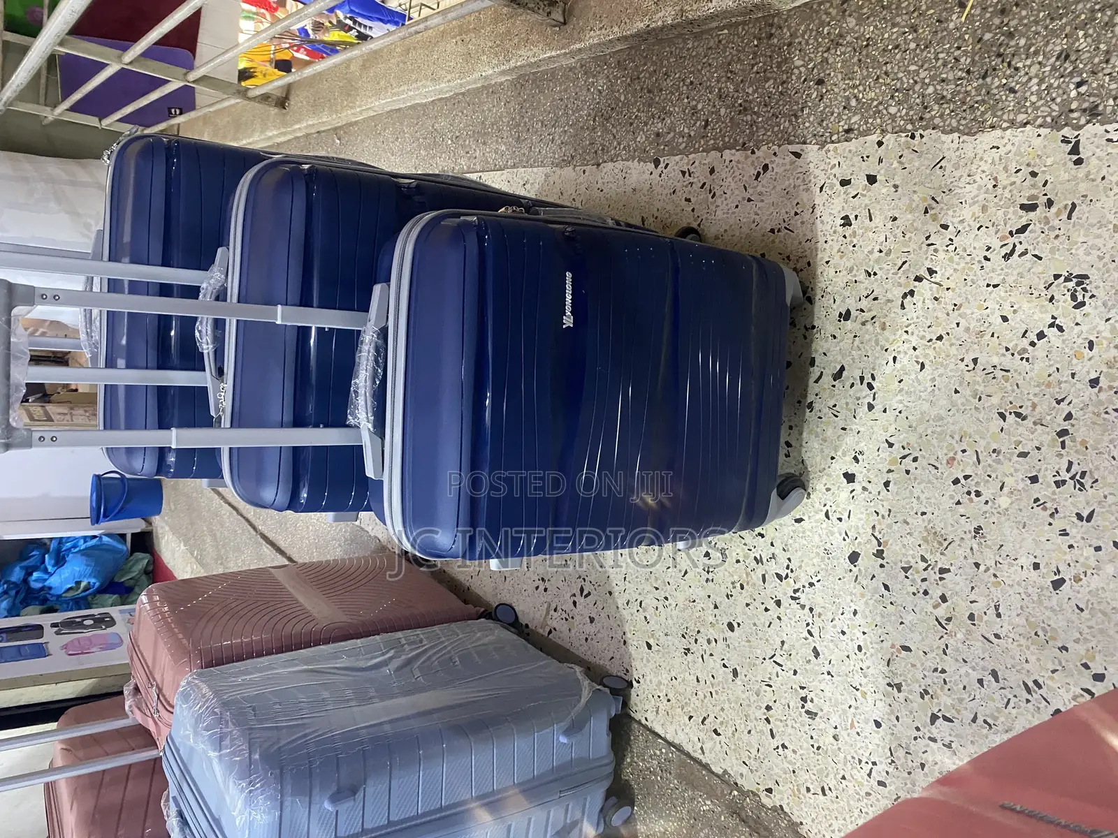3 Piece Set of Black Suit Cases