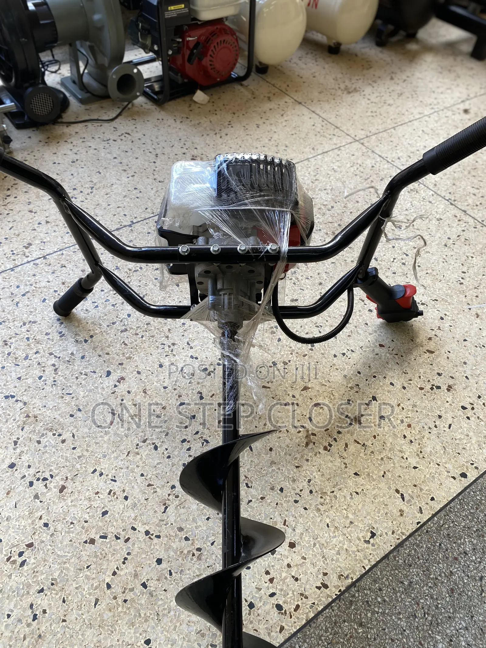 Earth-Auger Machine
