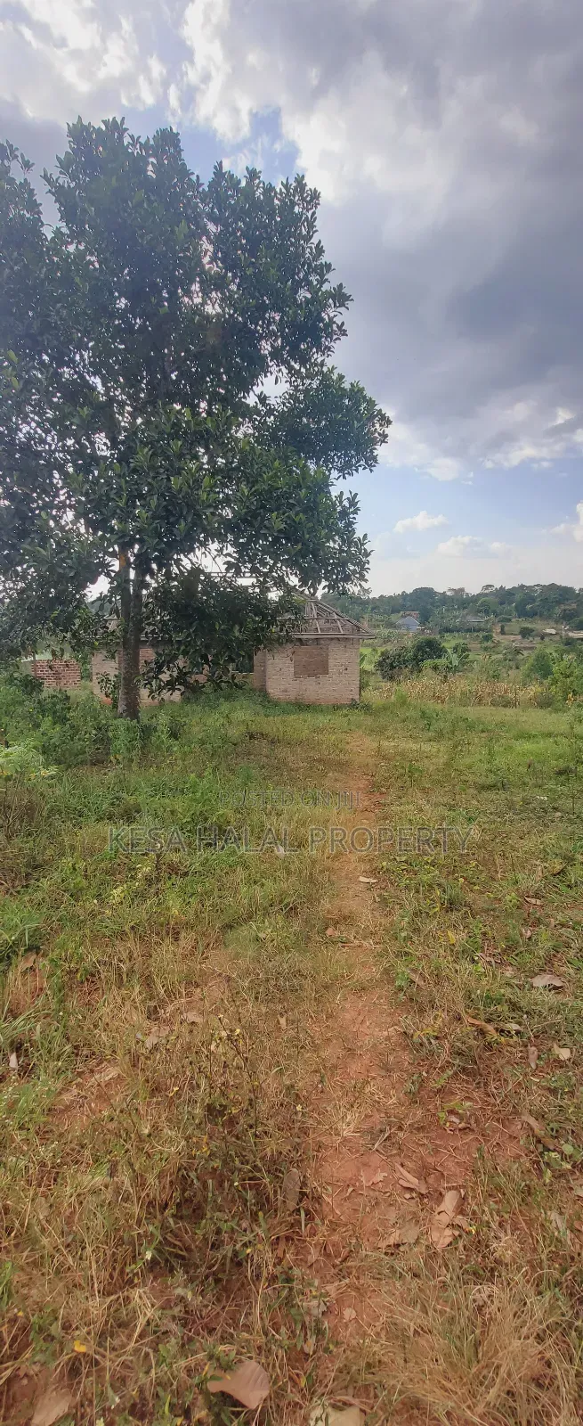 Titled 1.39 Acres With Unfinished House in It Good View