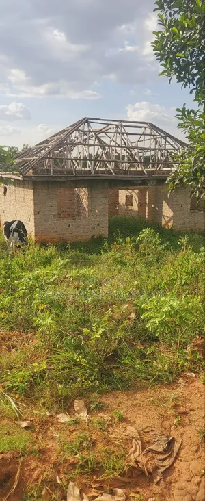 Titled 1.39 Acres With Unfinished House in It Good View