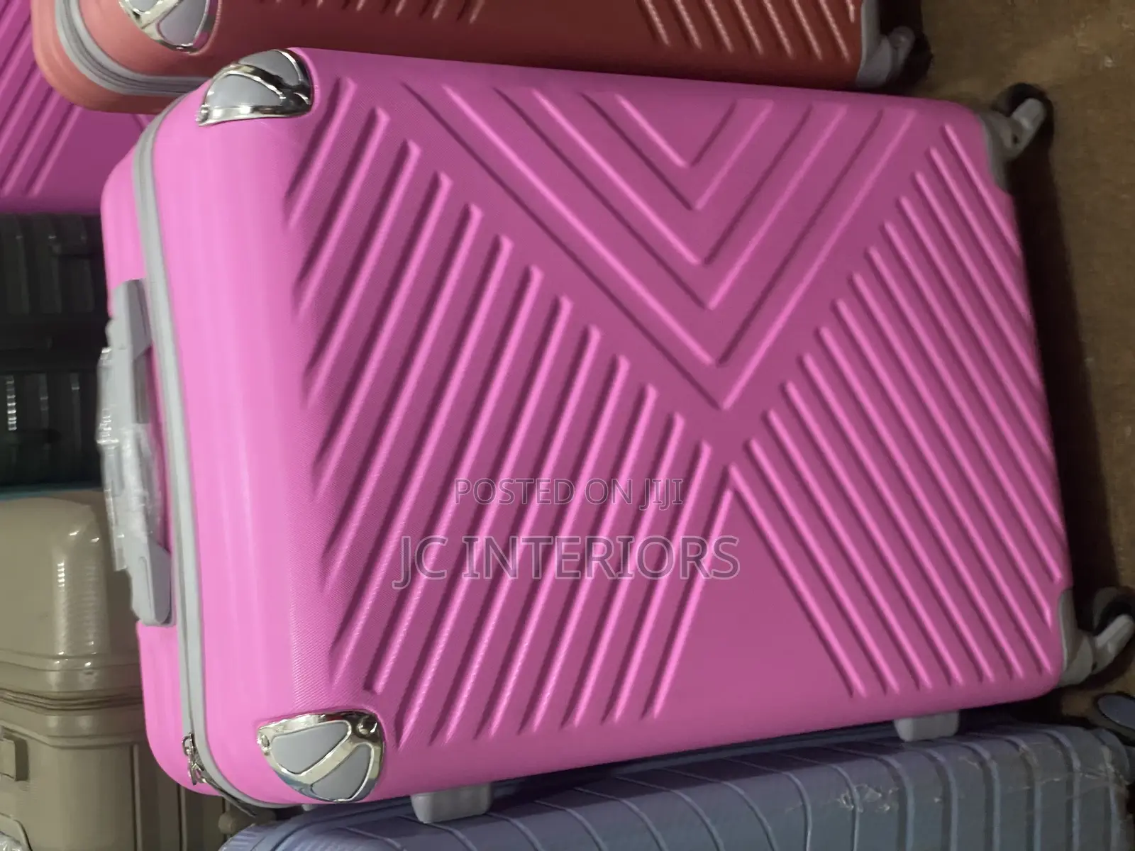 Patterned Plastic Suit Cases