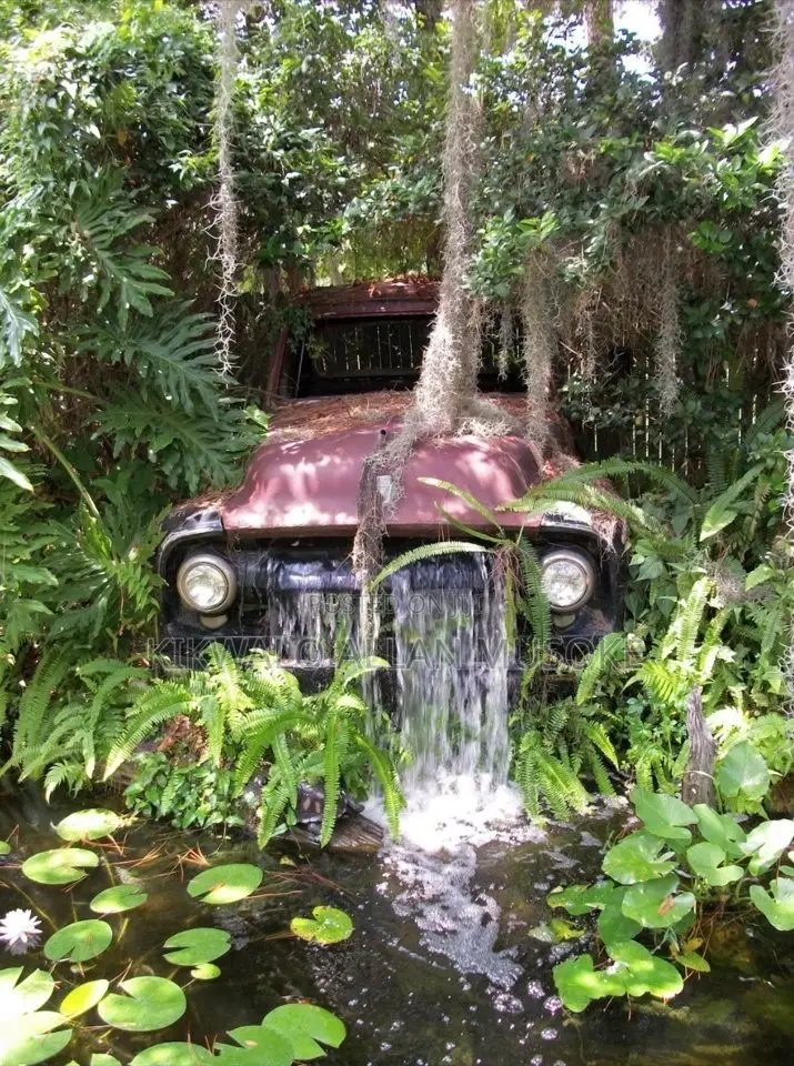 Waterfall, Fountain, Antique Bolders, Rock Garden Services.