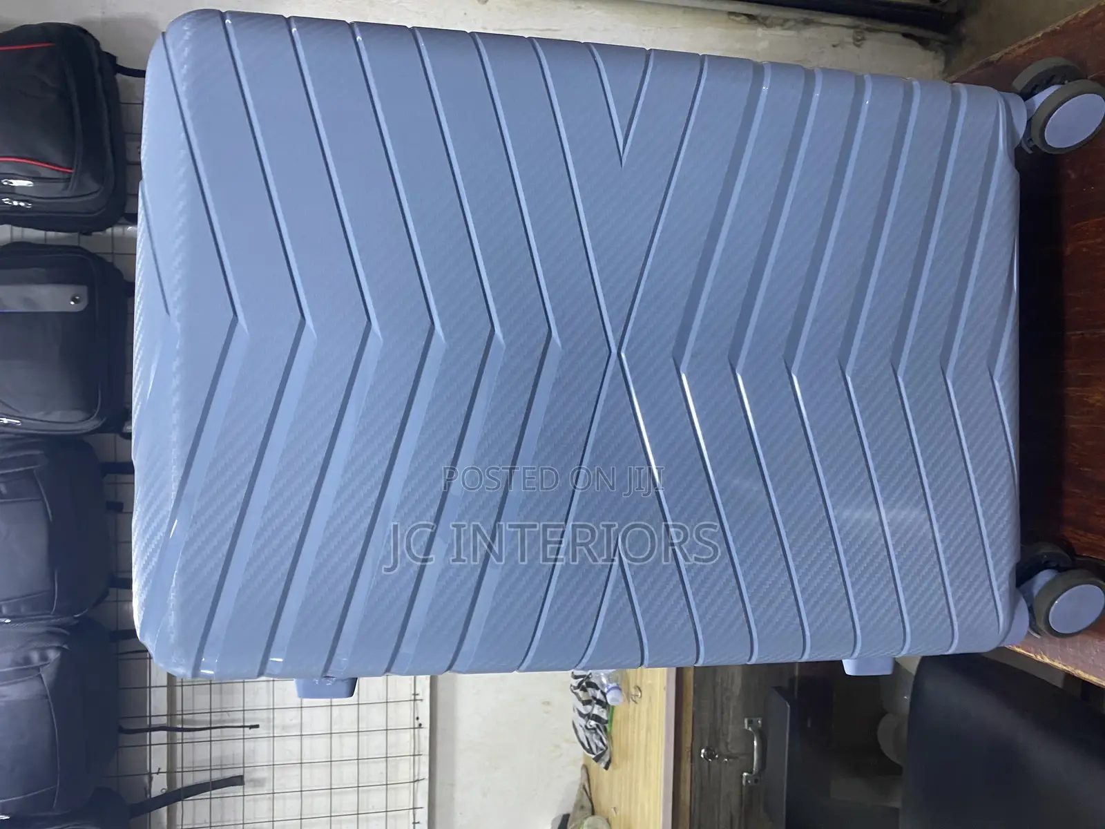 Blue v- Patterns Suit Cases