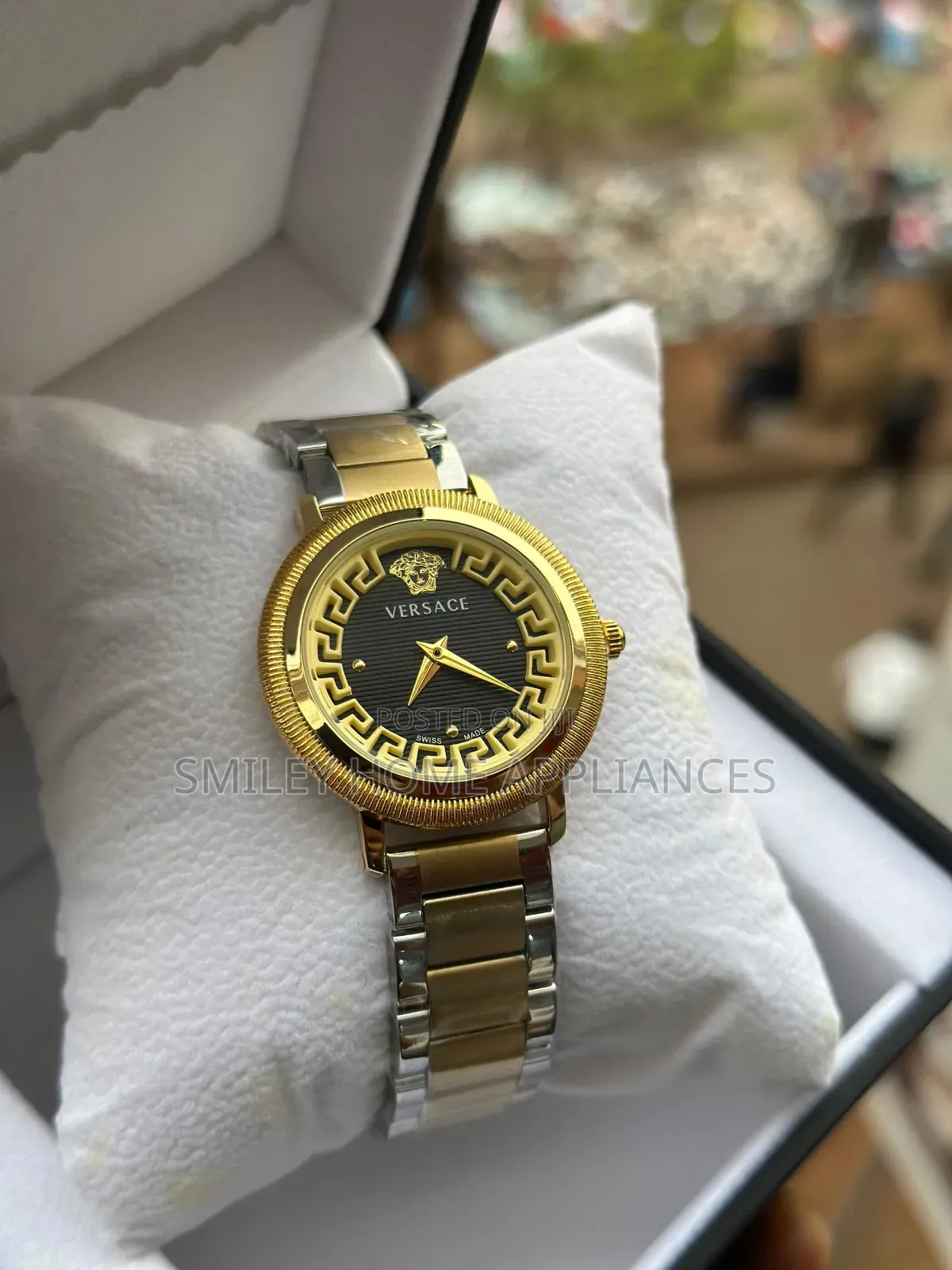 Women's Silver Brown Versace Wrist Watch With a Black Face