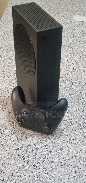 Xbox Series S Black in Color With One Gaming Pad.
