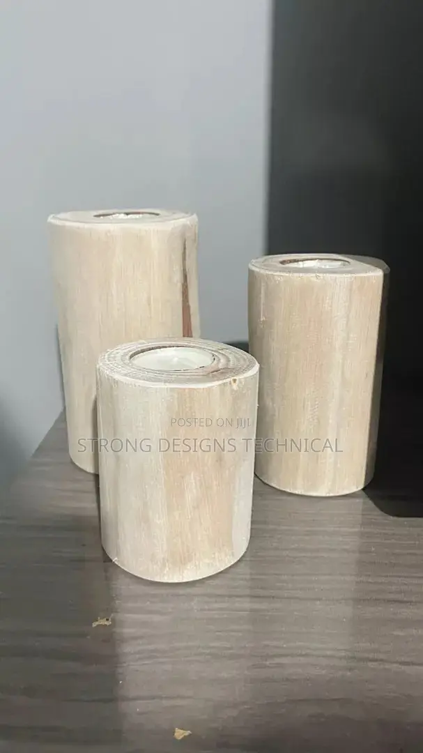 A Trio of Wooden Candle Holders for Home Decoration
