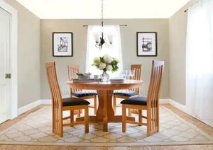 Round Dinning Table in 4 Sitters/Hard Wood/Musambya