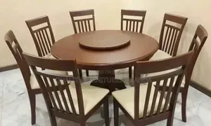 Photo - Rolling 8 Sitter Dinning Table