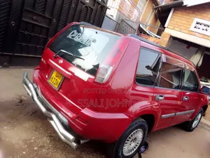 Photo - Nissan X-Trail 2003 Red