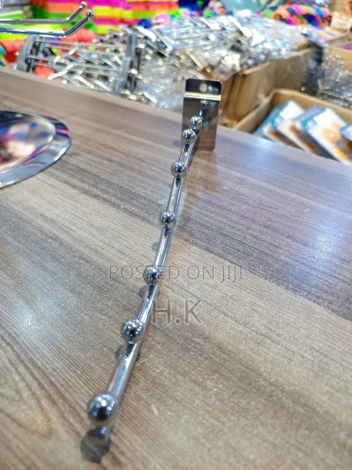 Wall-Mounted Clothes Hanger Rack.