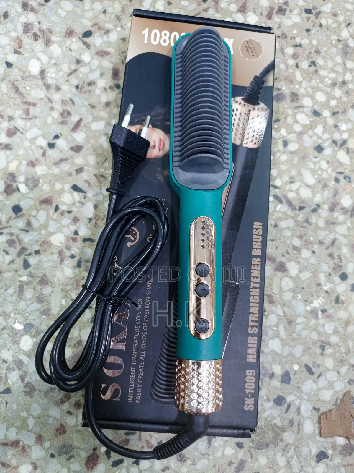 Sokany SK-1009 Hair Straightener Brush.