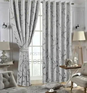 White With Gold Curtains With a Net