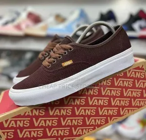 Photo - Coffee Brown and Sales White Van's for Man and Women