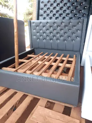 Photo - Elegant Gray Tufted Leather Dressed Bed 5x6