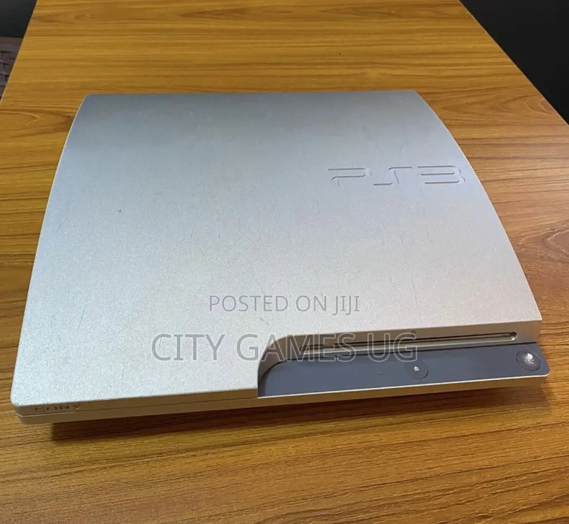 Silver Grey Playstation 3 Console With Controllers