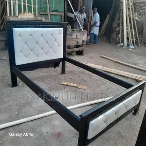 4x6 Black and White Bed With 4 Buttons on Back