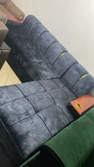 5 Seater Gray L Sofa With Gold Stickers and Gold Cups