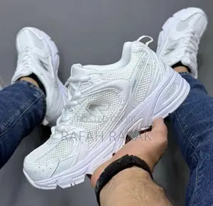 Original Unisex Triple White New Balance 560 Sneakers