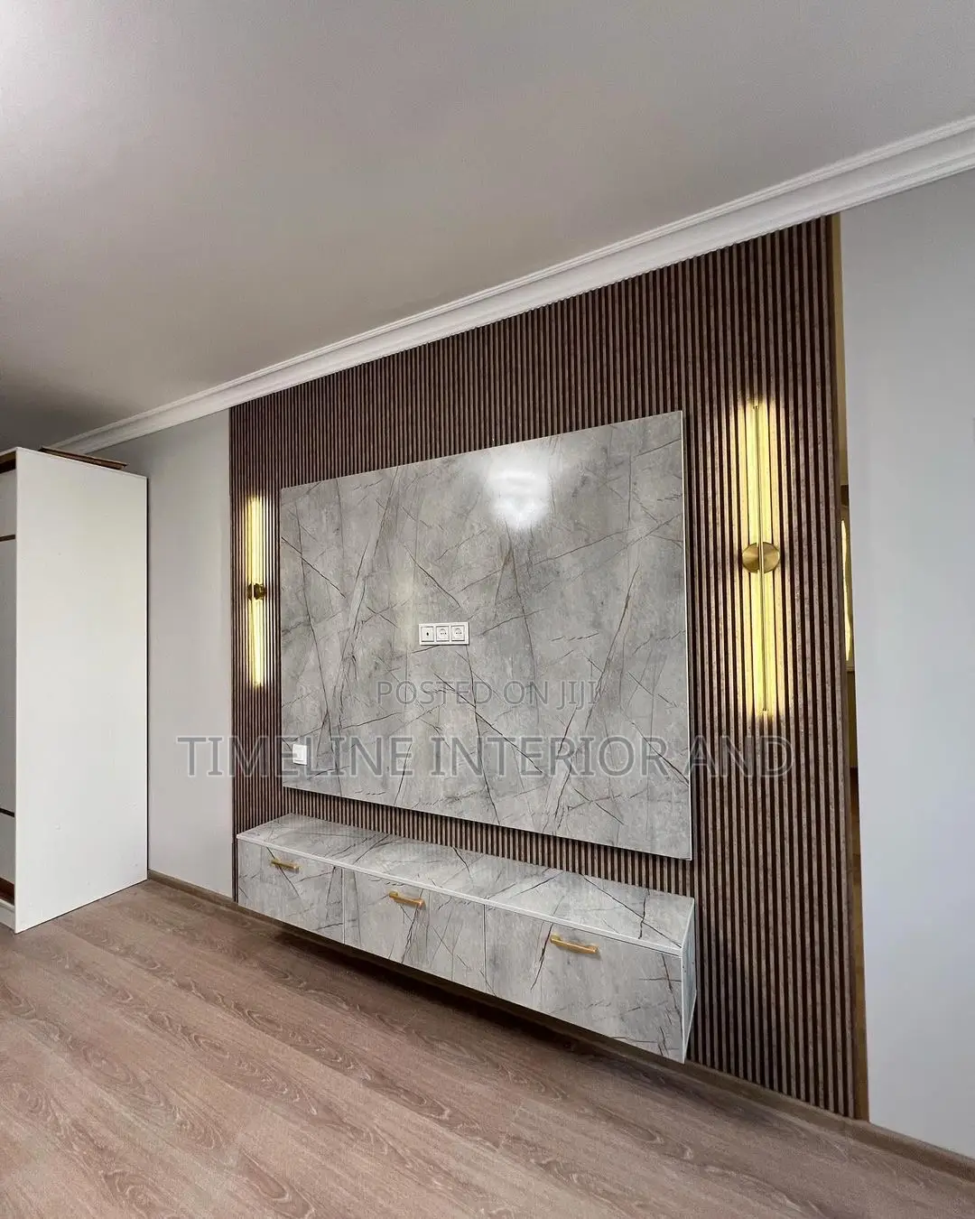Urban Elegance: PVC Fluted Panels and Marble Sheets TV Unit