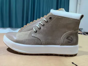 Brown and Sale White Boots E 