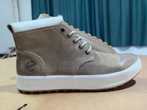 Brown and Sale White Boots E 