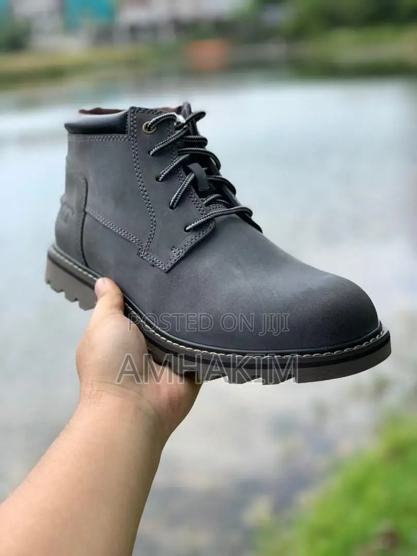 Men's Hard Leather Caterpillar Boots in Stock