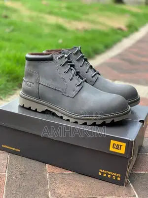 Men's Hard Leather Caterpillar Boots in Stock