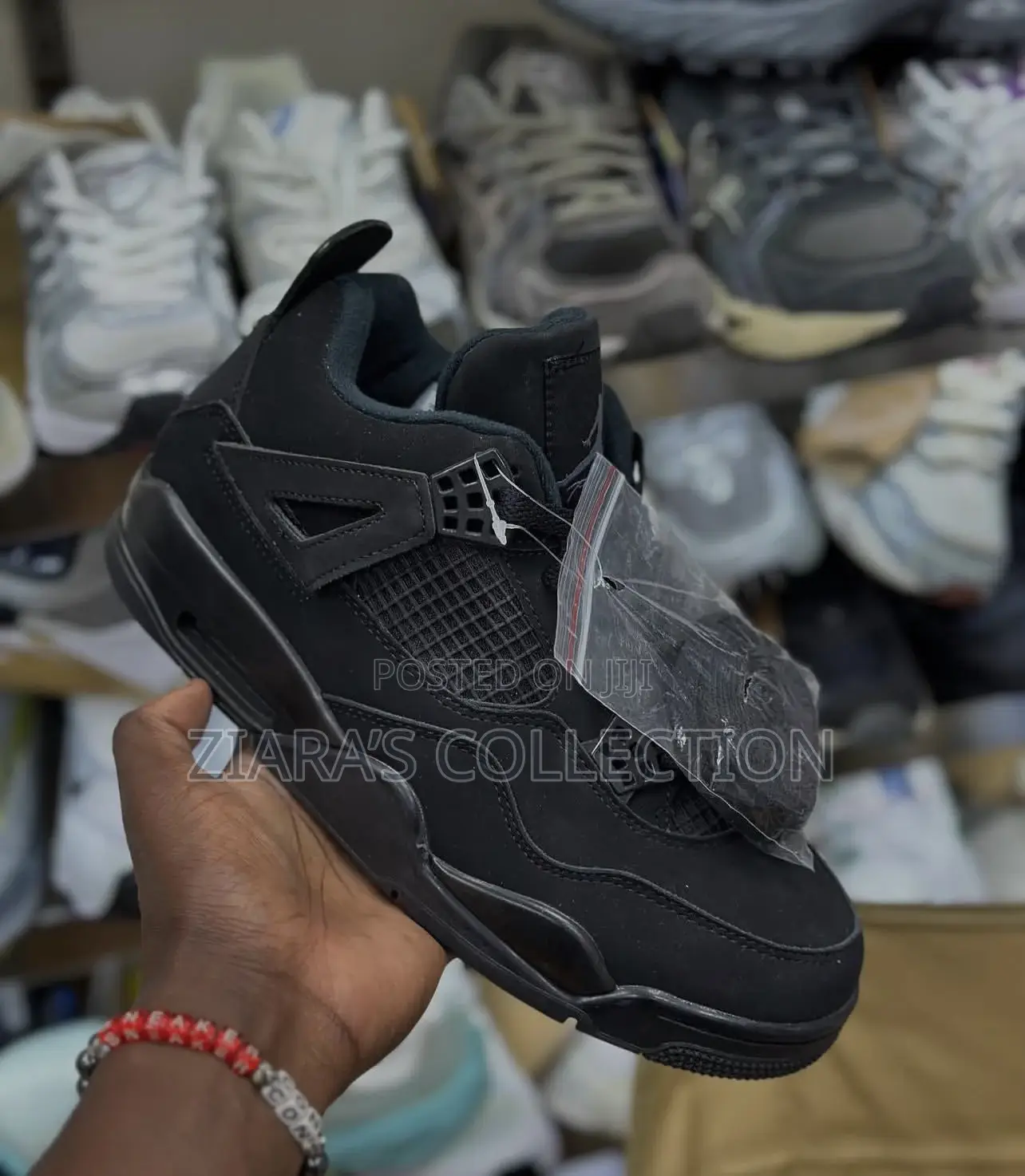Black Jordan 4 Sneakers