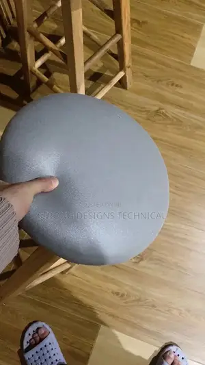 A Pair of Round Wooden Counter/ Bat Stools