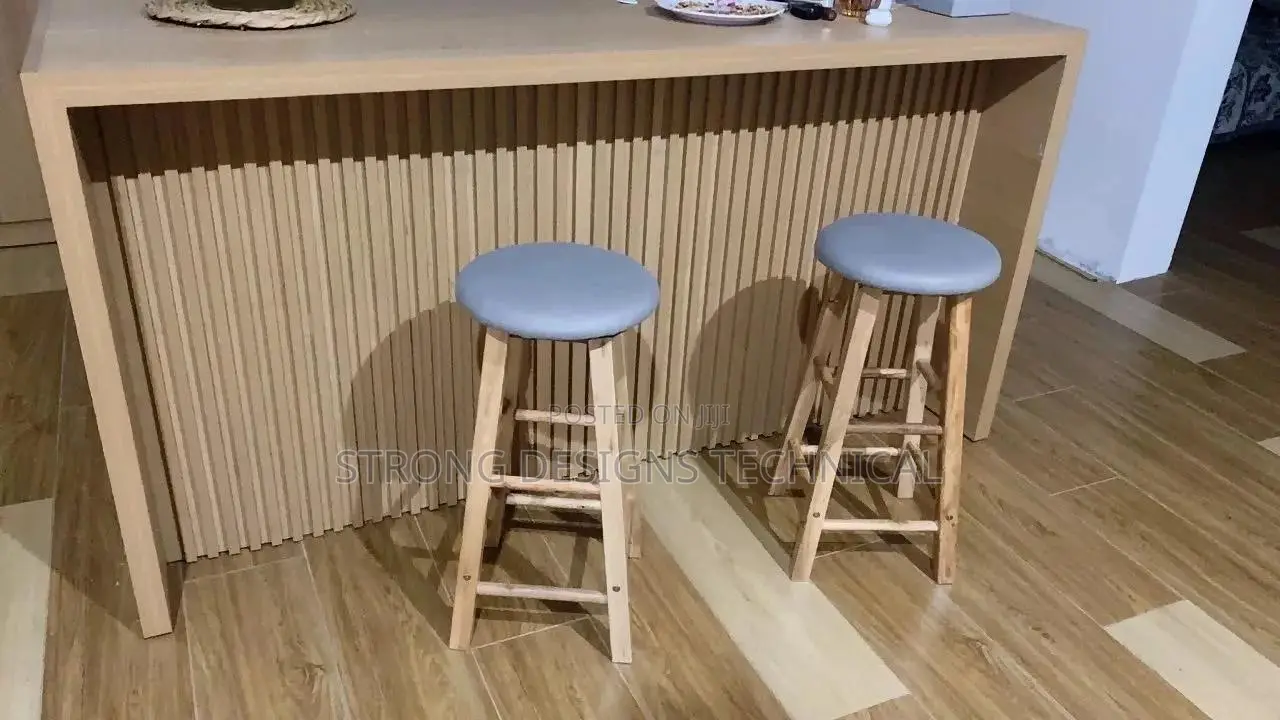 A Pair of Round Wooden Counter/ Bat Stools
