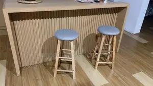A Pair of Round Wooden Counter/ Bat Stools
