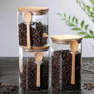 Kitchen Square Glass Jars With Wooden Lids and Spoons