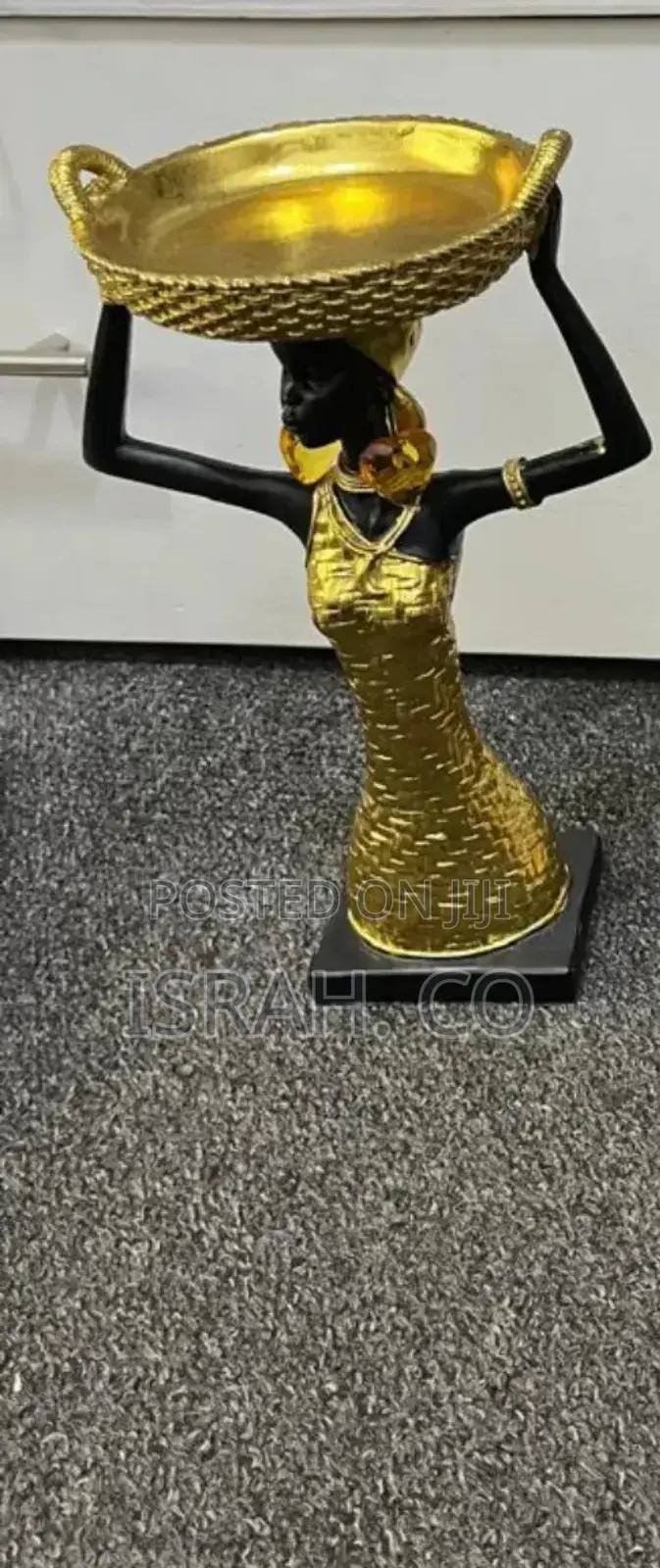 Depict Women in Traditional African Attire Figurines