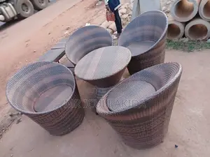 Malcolm Round Metallic Crafted Rattan Chairs WTH Table