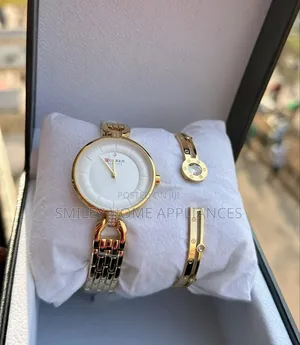 Women's Gold Curren Fashionable Watch With a Bracelet