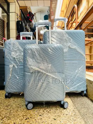 A Set of Shodealy Blue Rubber Suitcases Available