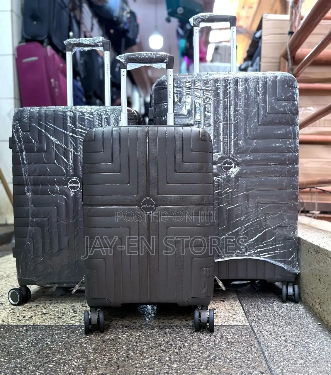 A Set of Shodealy Black Rubber Suitcases Available