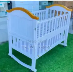 Photo - Wooden Baby Bed