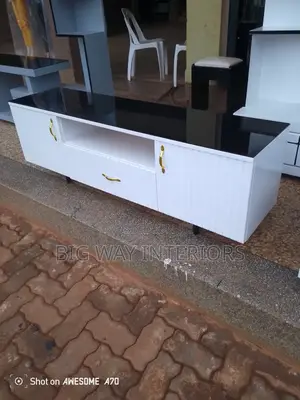 White Flat Tv Stand With Black Wooden Stands