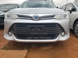 Photo - Toyota Corolla Fielder 1.5 Hybrid FWD 2016 Silver